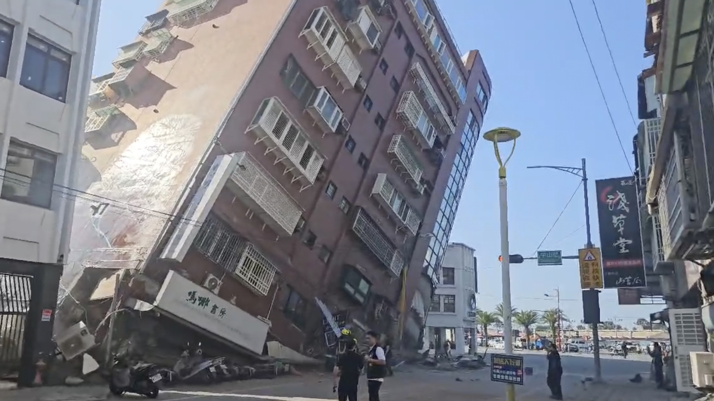 The earthquake rocks Taiwan, causing buildings to collapse and triggering warnings of a storm