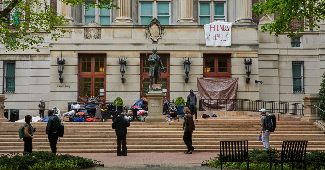 Columbia says it will throw students out of a building